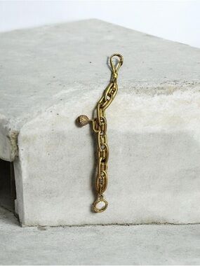 Henri Bendel Gold Link Chain Bracelet with Charm